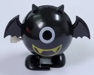 Заводная игрушка Черный Летучий Мышь с золотым клювом